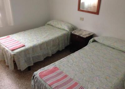 camas individuales pensión glorioso hostel
